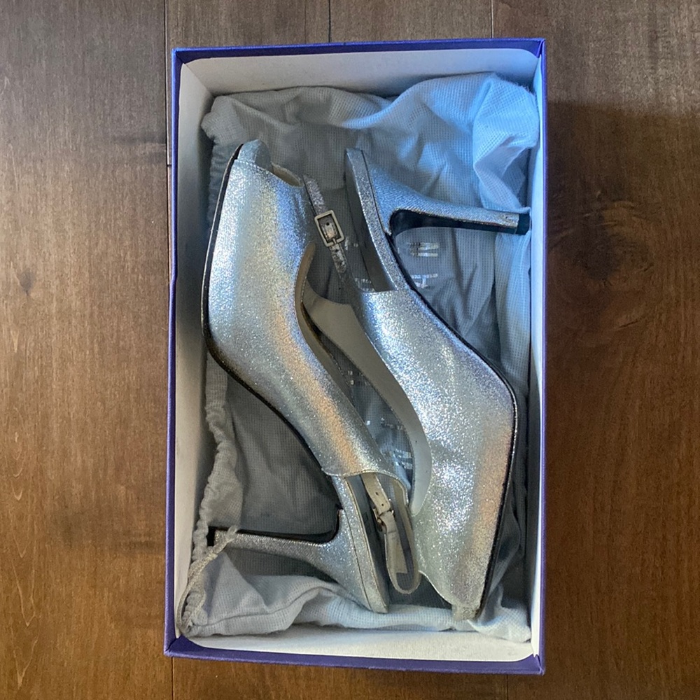 pretty stuart weitzman silver high heels!! * decently worn*